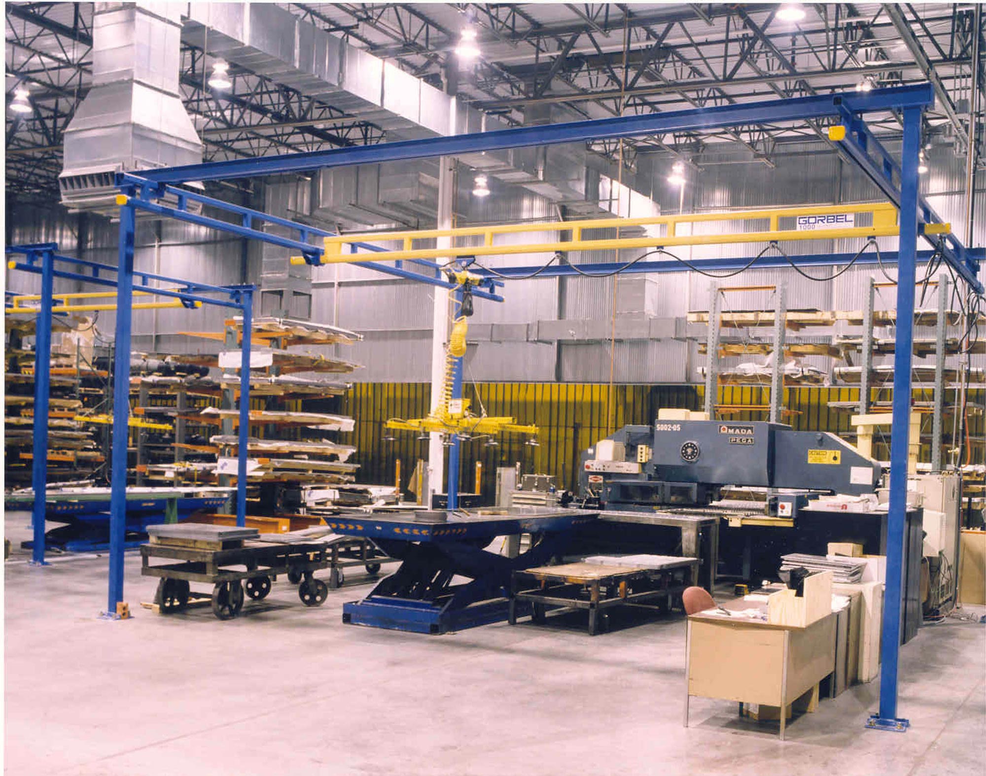 A 1000lb capacity freestanding bridge crane manufactured by Gorbel, distributed by Harriman Material Handling